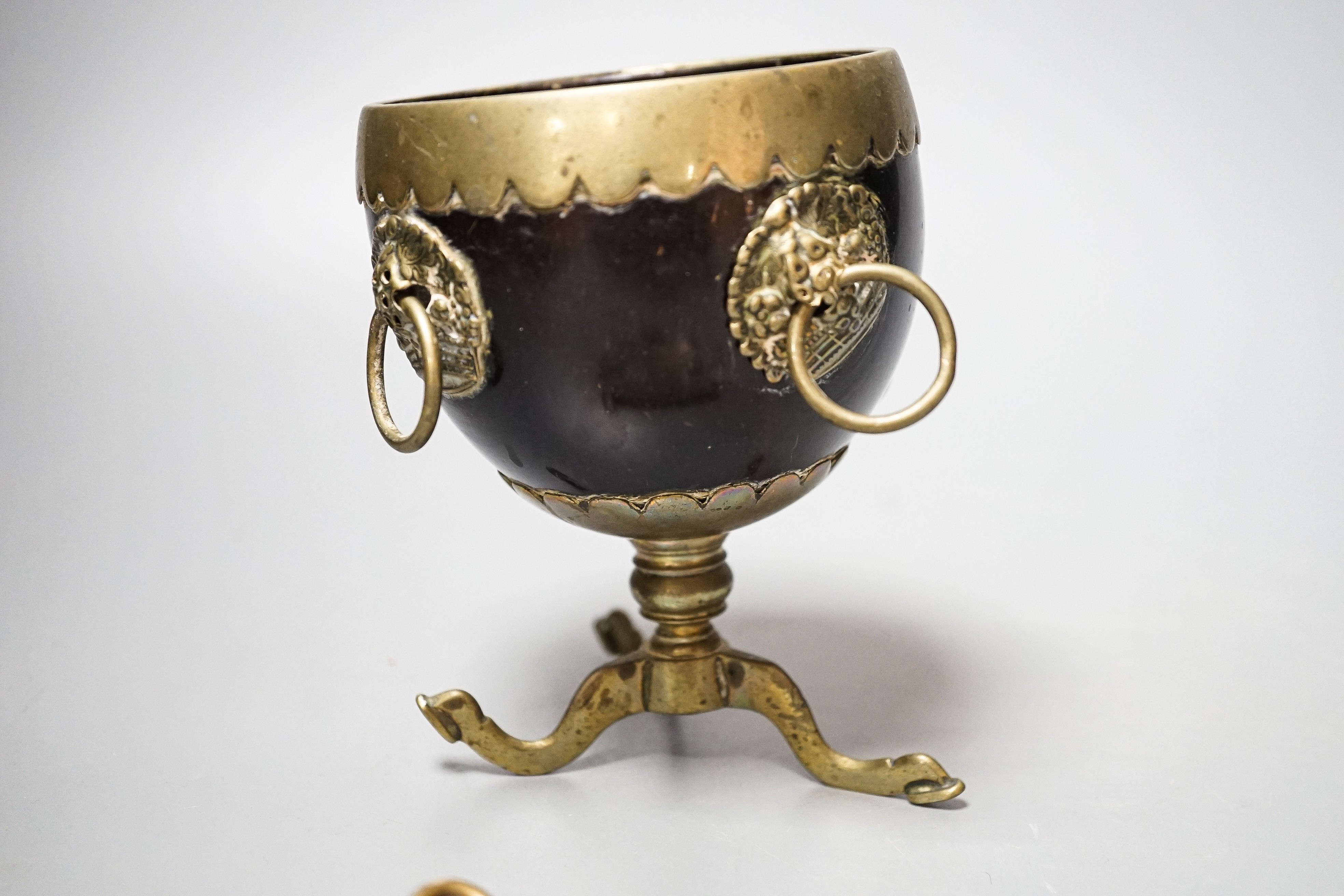A Victorian regimental belt buckle, Prince of Wales plume, coconut cup, 13cm
